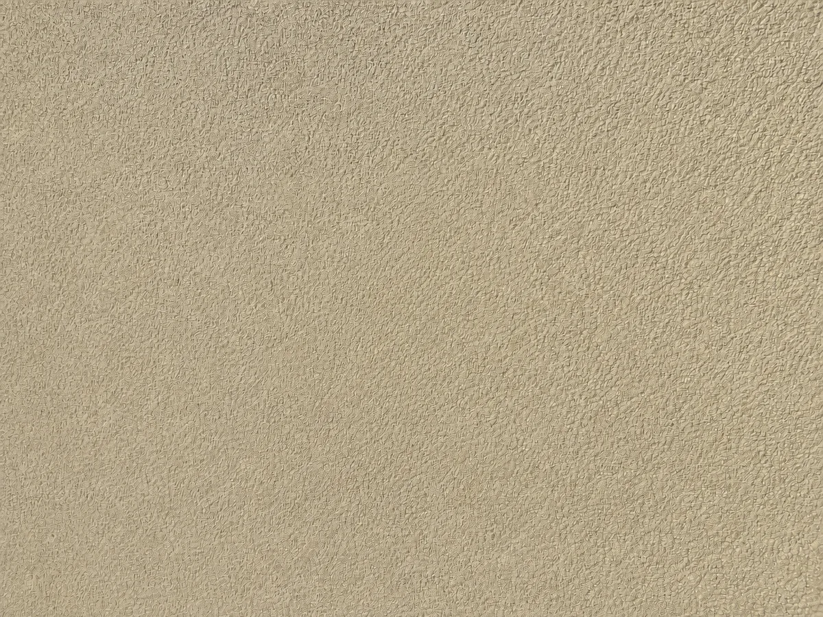 Même portion de mur après application du mastic polymère hybride, lissage et reprise de peinture